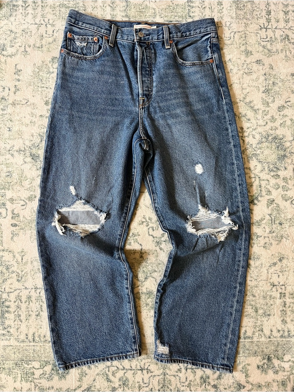 Levi’s distressed Navy jeans